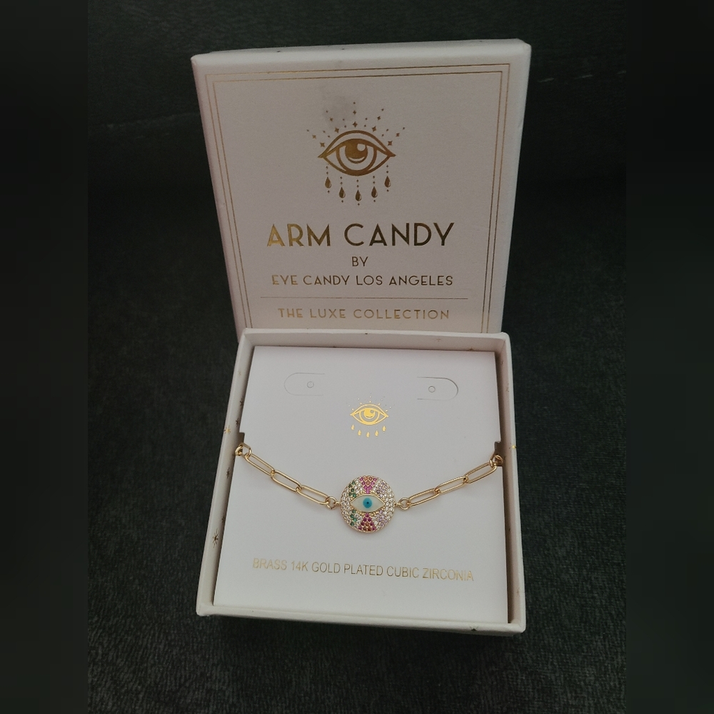 Brass 14K Gold plated cubic zirconia eye bracelet .